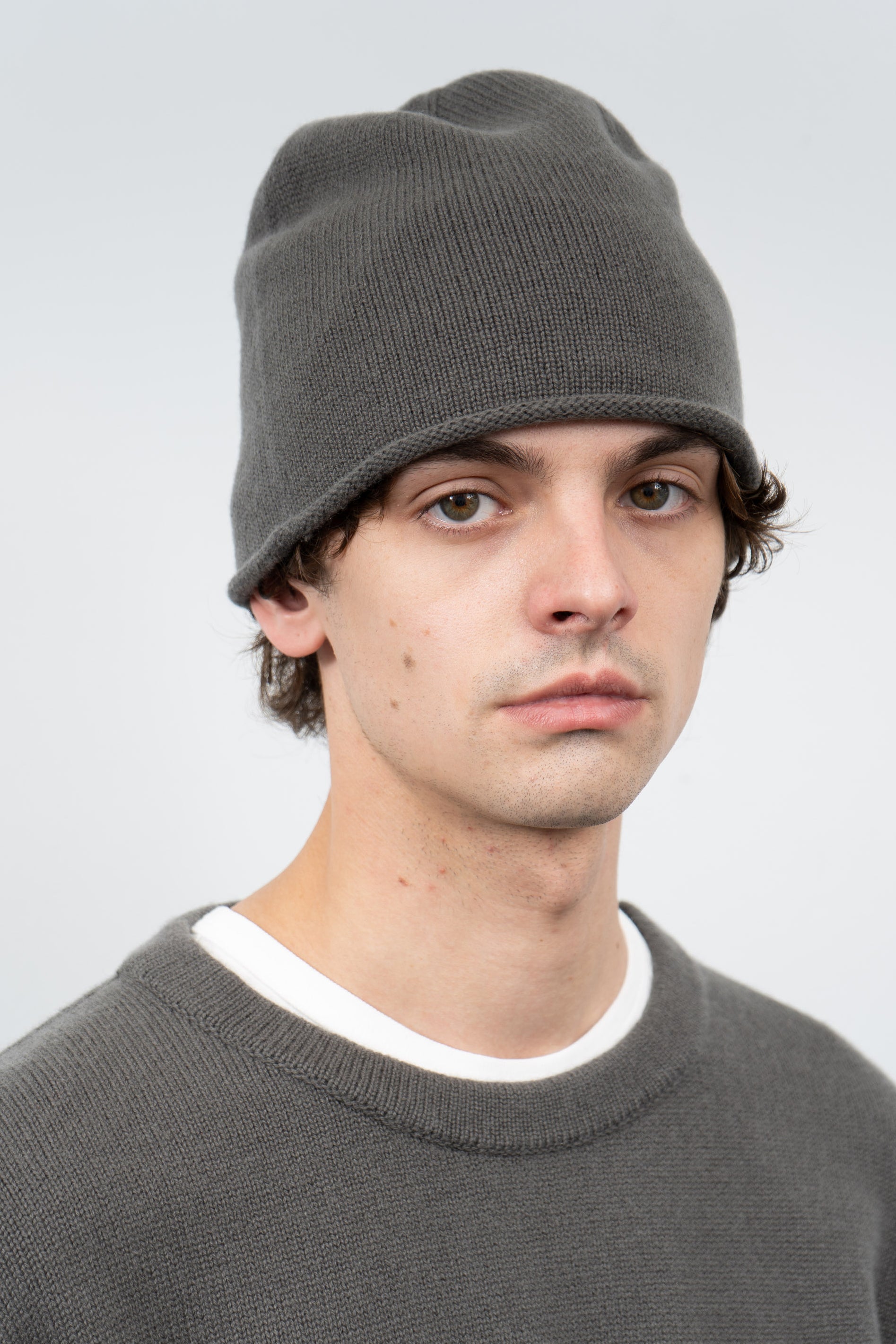 Close-up of model wearing LW036 Ambrosia Beanie in marine gray