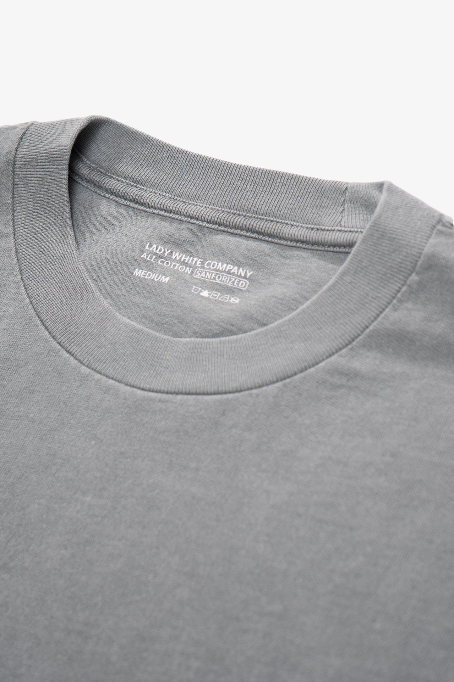 Close-up of collar of LW102 Municipal T-shirt in pigment kelp