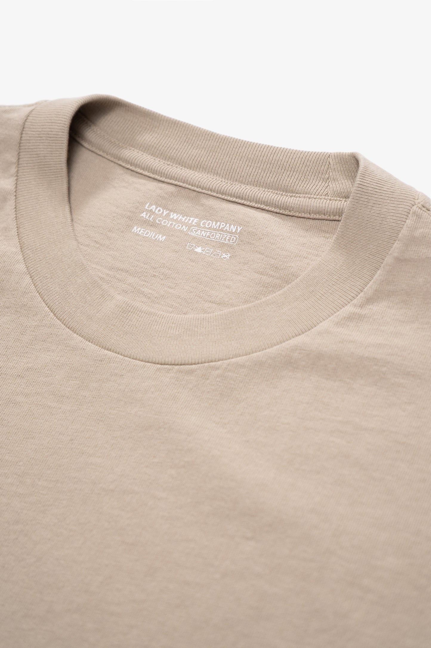 Close-up of collar of LW102 Municipal T-shirt in sand