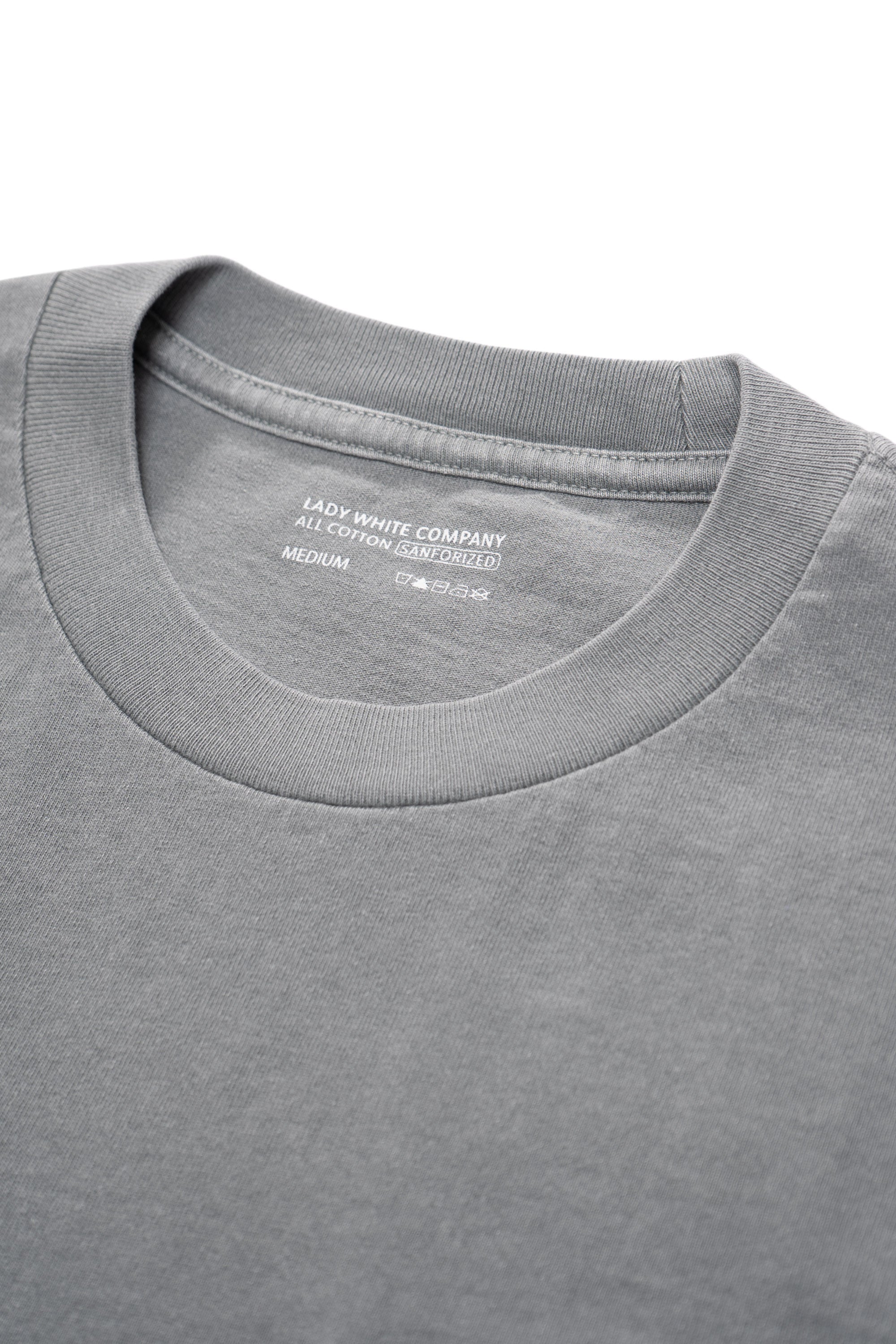 Close-up of collar of LW103 Municipal Packet T-shirt in pigment kelp