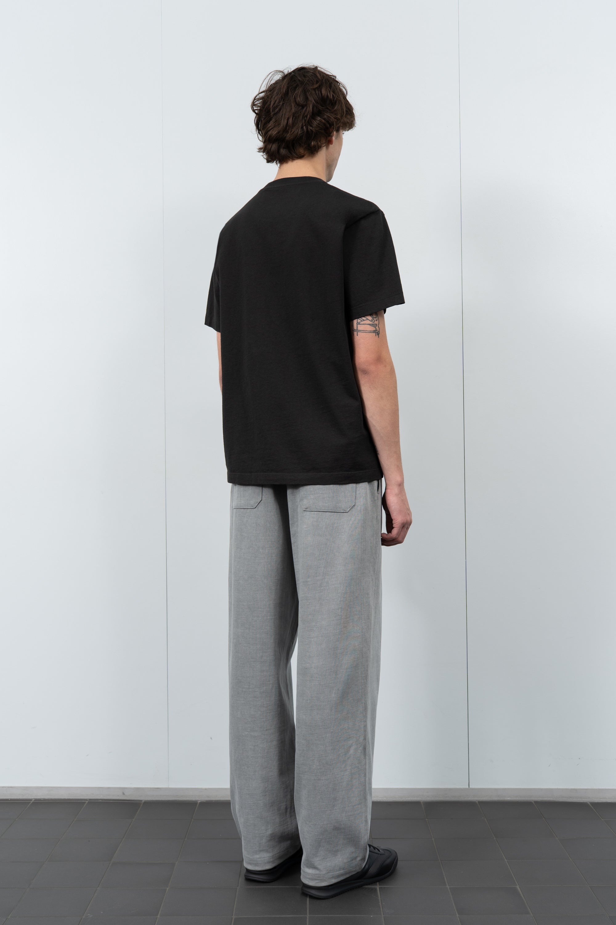 Model poses in LW103 Municipal Pocket T-shirt in Shadow