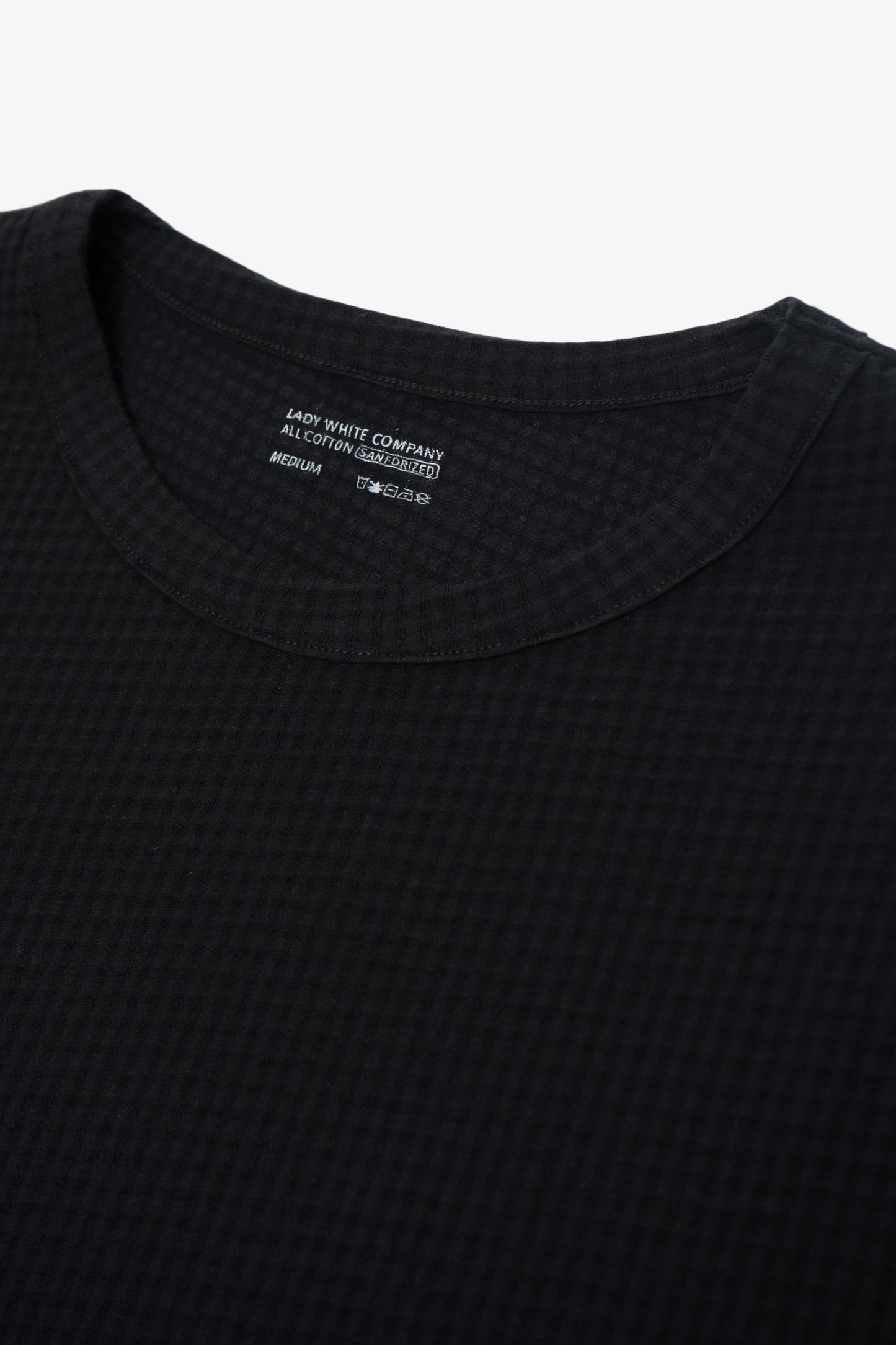 GAUZE SLEEVELESS T-SHIRT - BLACK