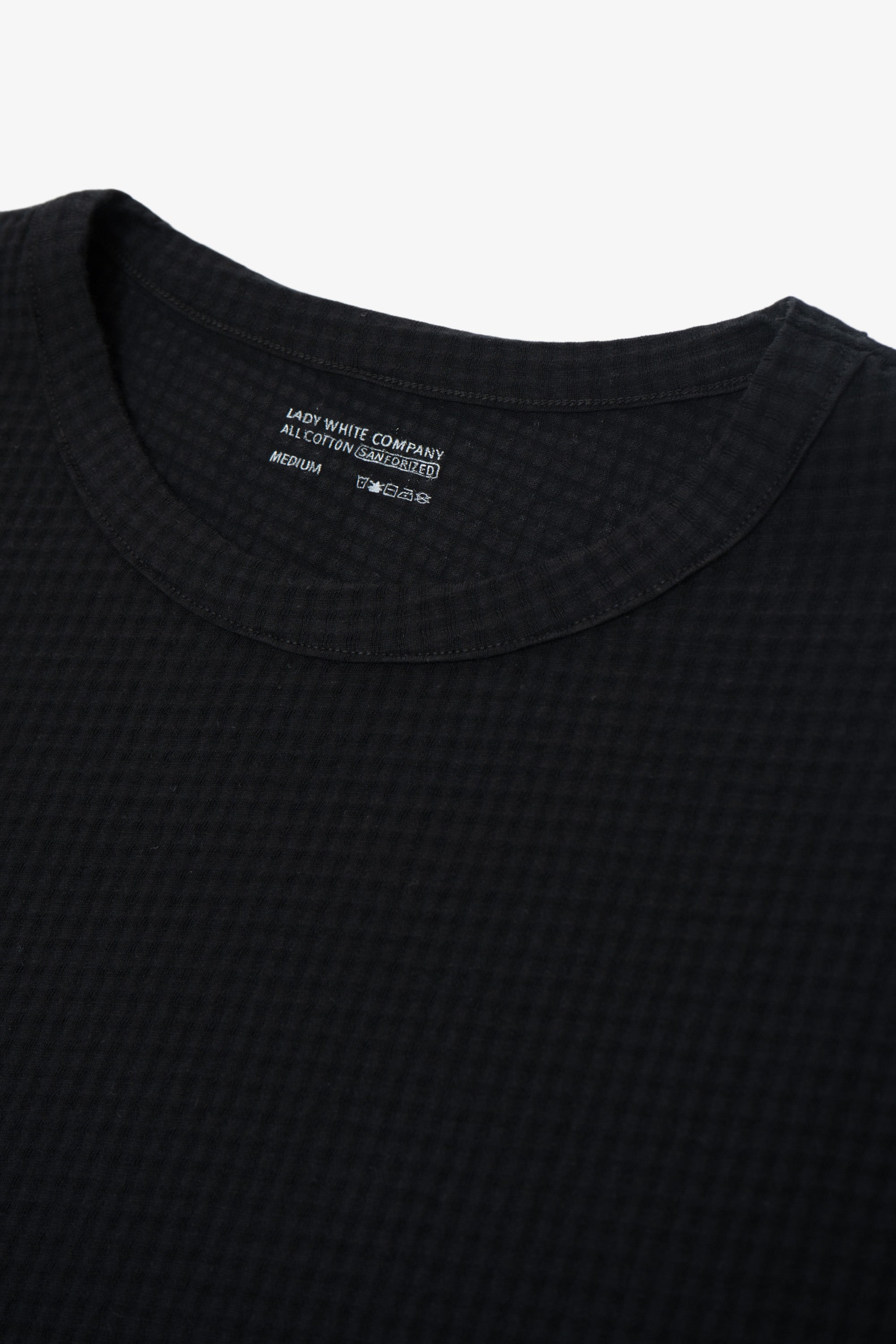 GAUZE SLEEVELESS T-SHIRT - BLACK