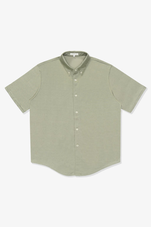 Full length flat-lay photograph of the LW423CR SS CR Button Down in a flat, pastel green, “Pistachio”