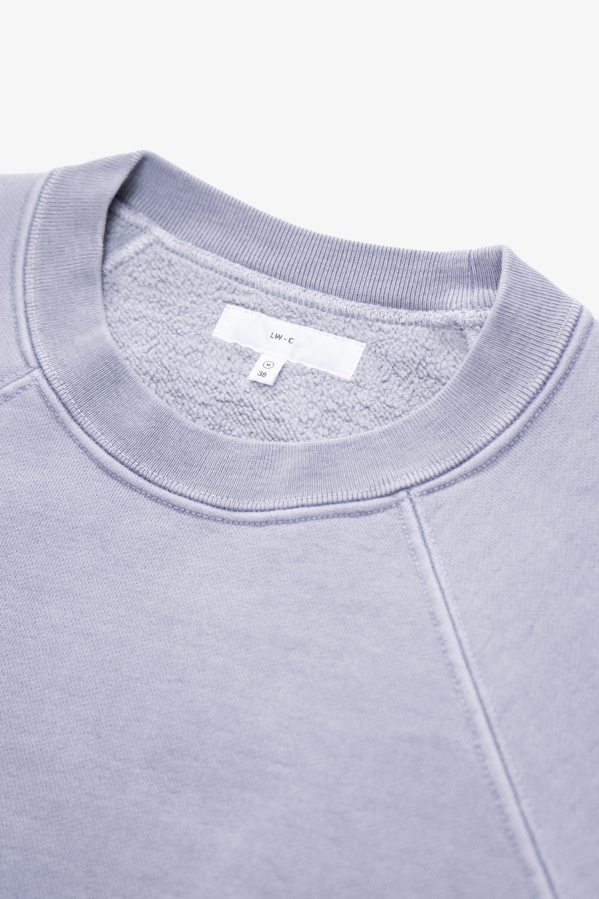 Close-up of collar of LW620 Heavy Gusset Crewneck in lilac grey