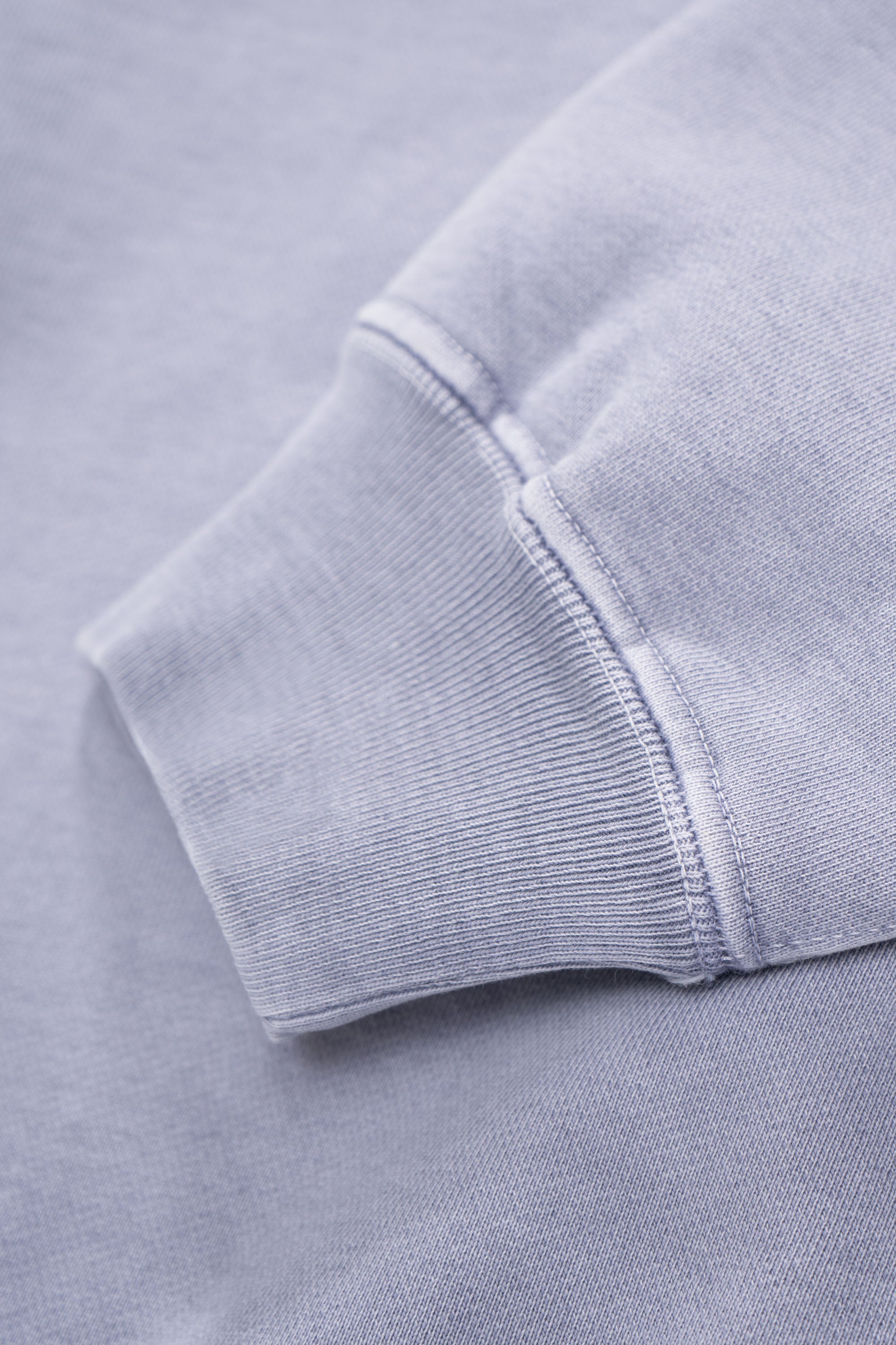 Close-up of cuff of LW620 Heavy Gusset Crewnenck in lilac grey