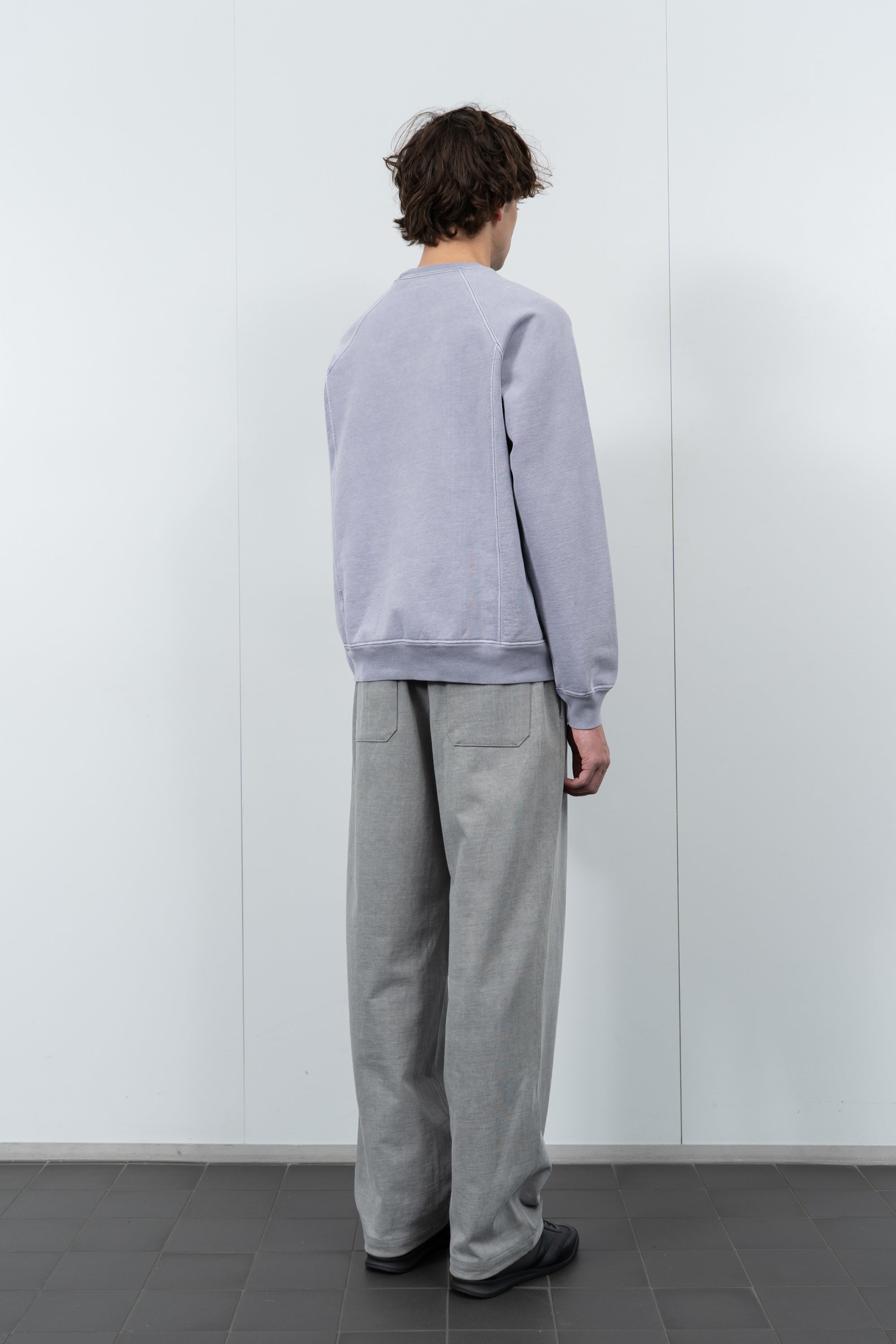 Model poses in LW620 Heavy Gusset Crewneck in lilac grey