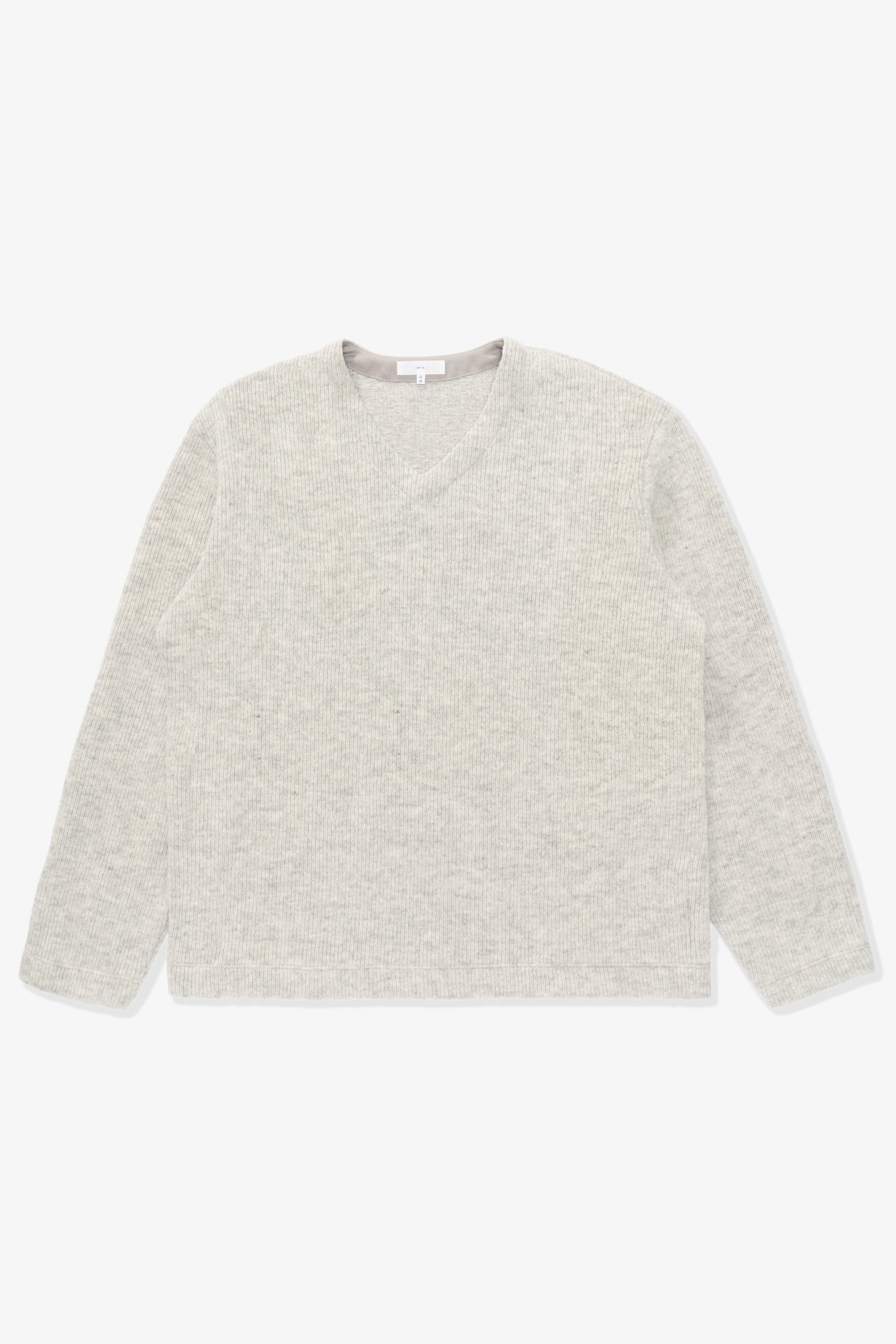 Full-length flat-lay photo of LW770CW V Neck Snap Sweater in Oatmeal