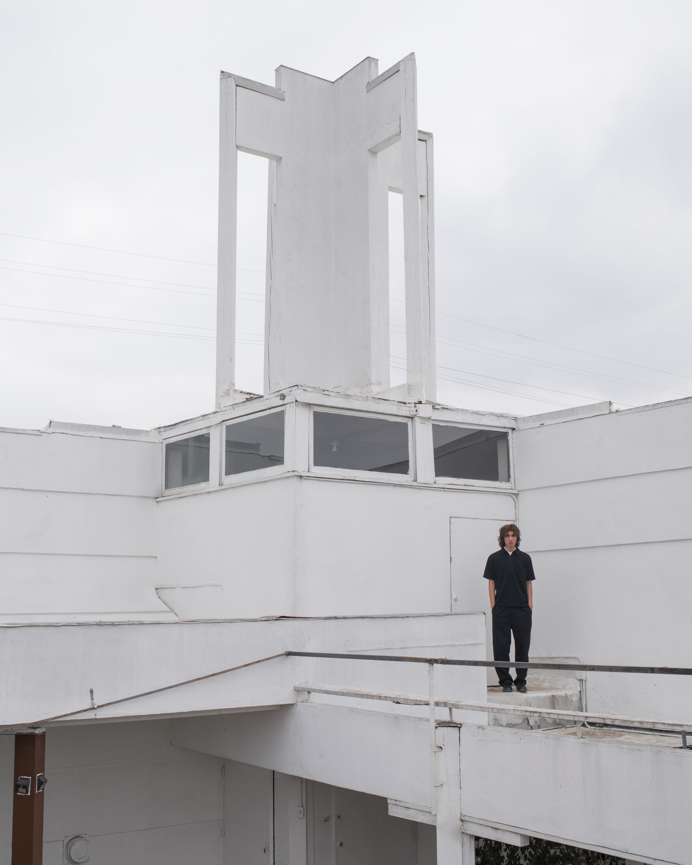 LADY WHITE CO MODEL POSES FOR SS-24 COLLECTION EDITORIAL AT A RUDOLPH SCHINDLER-DESIGNED CHURCH IN SOUTH LOS ANGELES. 